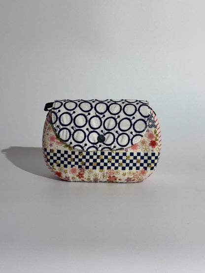 Borsa Luna disegni geometrici blu e righe rosa